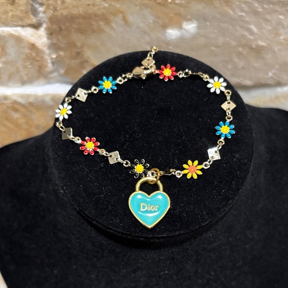 Dior Gold Bracelet with Red, Blue, and Yellow Floral Charms - Picture 1 of 3